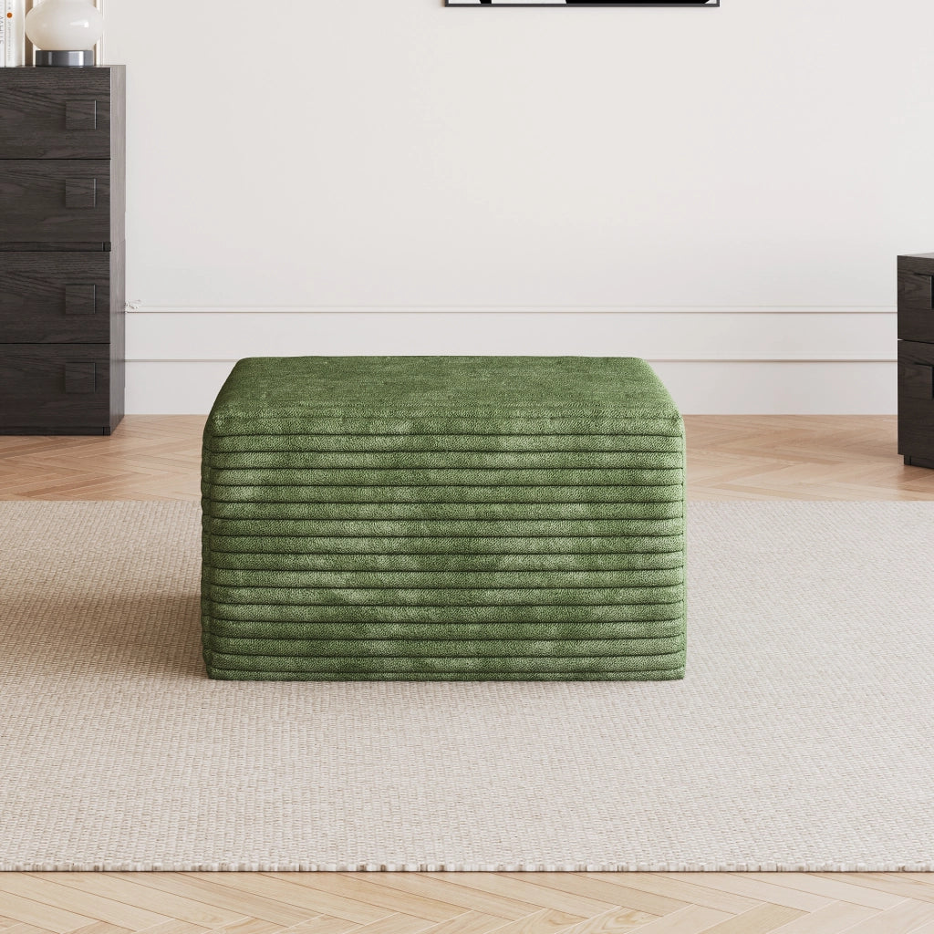 Poltrona pouf con seduta in schiuma ad alta elasticità e rivestimento in tessuto a coste verde