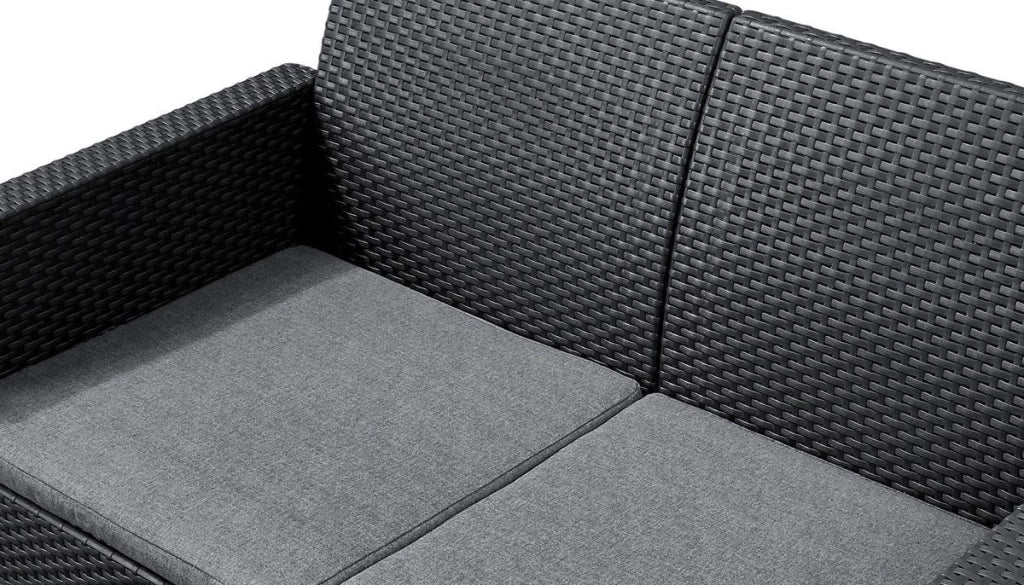 Salottino da Esterno Emma Lounge Set 4 Pezzi in Resina Effetto Rattan Colore Graphite con Divano, 2 Poltrone e Tavolino Contenitore Keter
