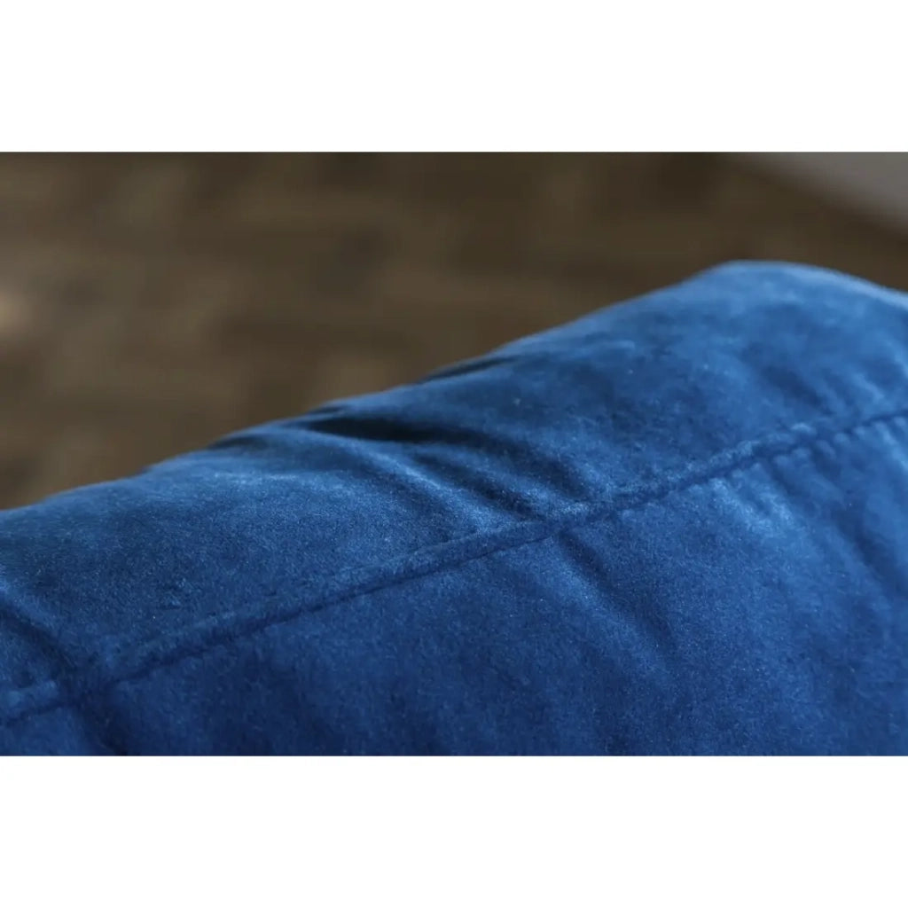 Divano ad angolo reversibile KOLIRI blu – Divano di design in velluto con pouf abbinato